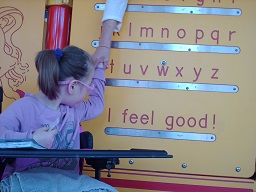 A child reading the Braille wall at Fairmount park